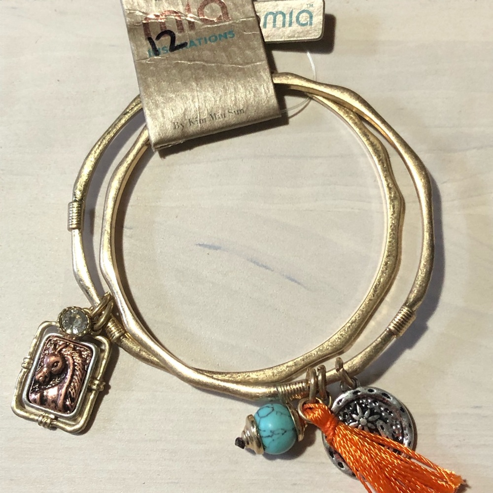 Metal bangles with charms